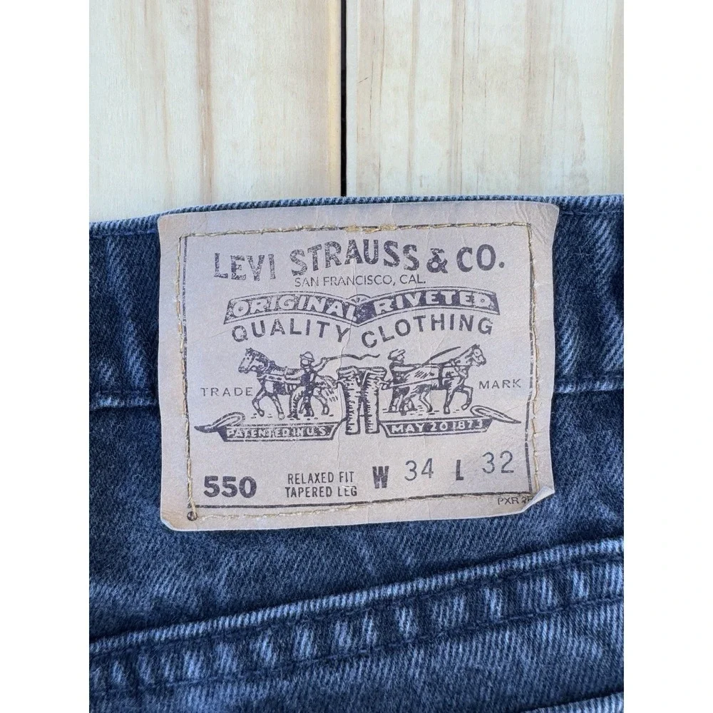 Vintage Black Levi's 550 Relaxed Fit Tapered Leg Orange Tab 34x32